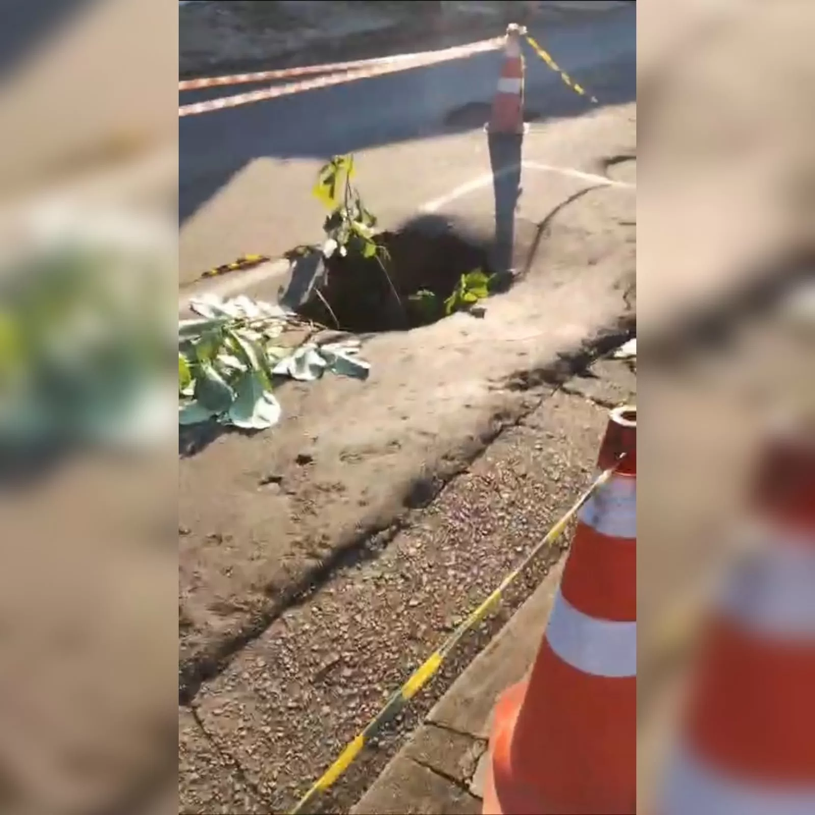 Buraco causado por erosão preocupa motoristas perto do Hospital Alzira Velano, em Alfenas